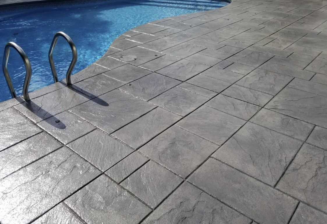 Stamped concrete patio with stone-like appearance in Olive Branch, MS